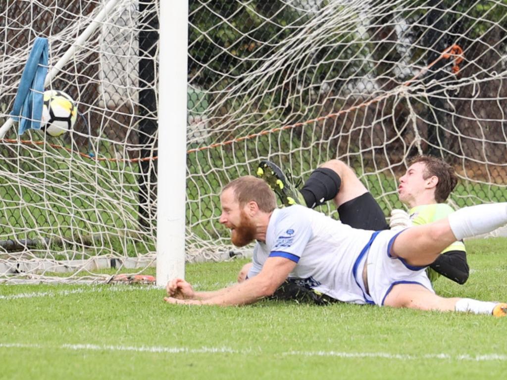 Martin Skinner's diving header for the Northern Storm in the opening CPL match against Coffs United. Coastal Premier League. Photo: David Wigley