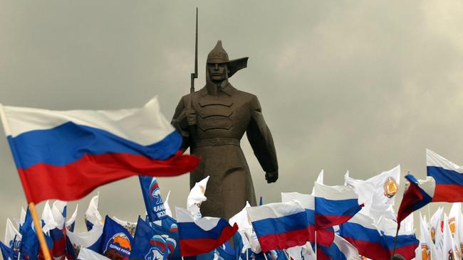 Pro-Kremlin activists in Stavropol celebrate Russia’s incorporation of Crimea in 2014. Picture: AFP