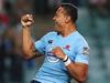 SYDNEY, AUSTRALIA - APRIL 19: Israel Folau of the Waratahs celebrates scoring a try during the round 10 Super Rugby match between the Waratahs and the Bulls at Allianz Stadium on April 19, 2014 in Sydney, Australia. (Photo by Mark Metcalfe/Getty Images)