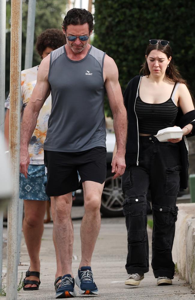 Hugh Jackman pictured with his kids Oscar and Ava walking home after breakfast at Speedo’s Bondi. Picture: Matrix Media Group