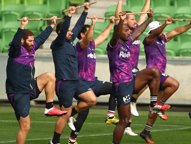 Storm players take part in a training drill at their home ground.