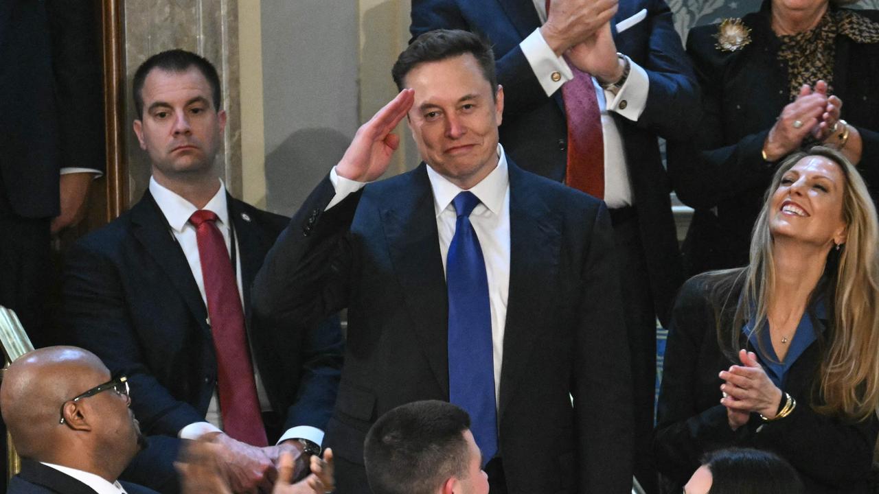 Musk stands as he is recognised by Mr Trump during his address to a joint session of Congress at the US Capitol in Washington, DC. Picture: Saul Loeb/AFP