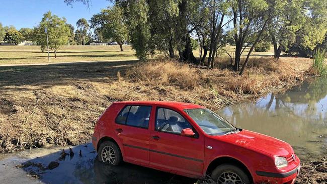 STUCK: A car was found early this morning stuck in Bungil Creek between Charles and Arthur Sts. Picture: Molly Hancock