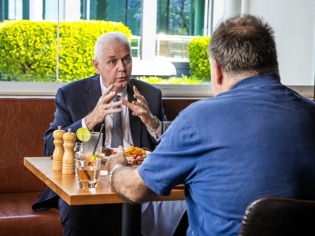 Lutheran Services CEO Nick Ryan speaks with Michael Madigan at The Boatshed Restaurant, Regatta Hotel. Picture: Nigel Hallett