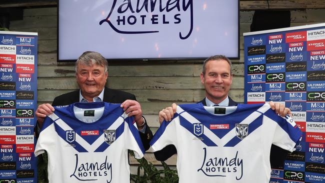 Canterbury Bulldogs sponsor launch with chief executive Andrew Hill at the Twin Willows Hotel, Bass Hill. Andrew holds the new Bulldogs jersey with Laundy Hotels owner Arthur Laundy. Picture: Brett Costello