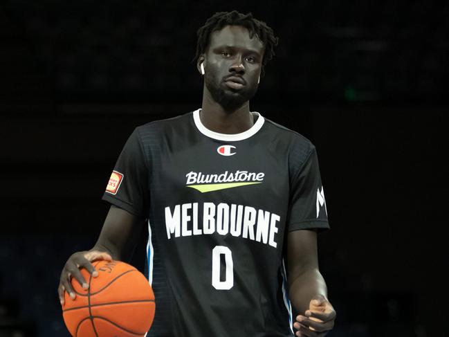 CAIRNS, AUSTRALIA - APRIL 10: Jo Lual-Acuil Jr of Melbourne United warms up prior to the round 19 NBL match between Cairns Taipans and Melbourne United at Cairns Convention Centre on April 10, 2022, in Cairns, Australia. (Photo by Emily Barker/Getty Images)