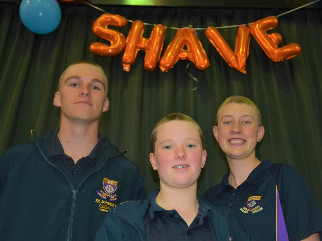 At the St Joseph's College 2023 World's Greatest Shave event are (from left) Charlie Kruger, Meghan Ellis and Emily Chandler. Picture: Rhylea Millar