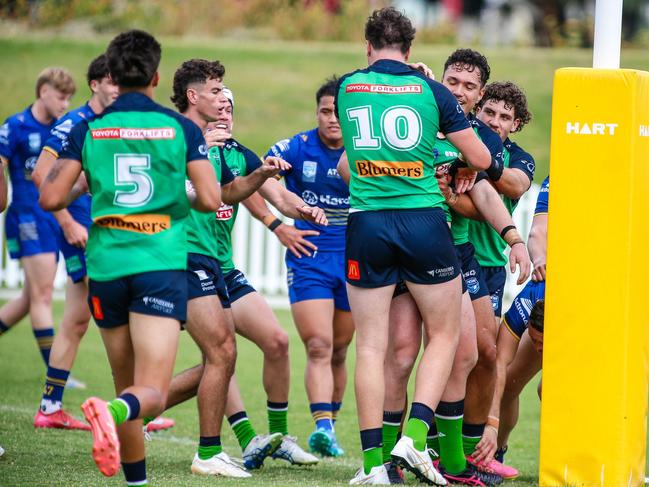 Canberra celebrates a try. Picture Warren Gannon Photography