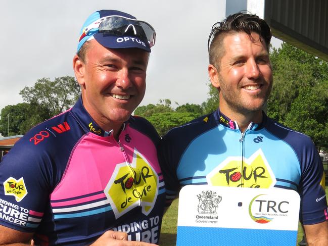 Tour de Cure co-founder and organiser Geoff Coombes, left, and Malanda State School principal Mark Allen in Queensland to promote the school's highly successful bike bus program. Picture: David Anthony