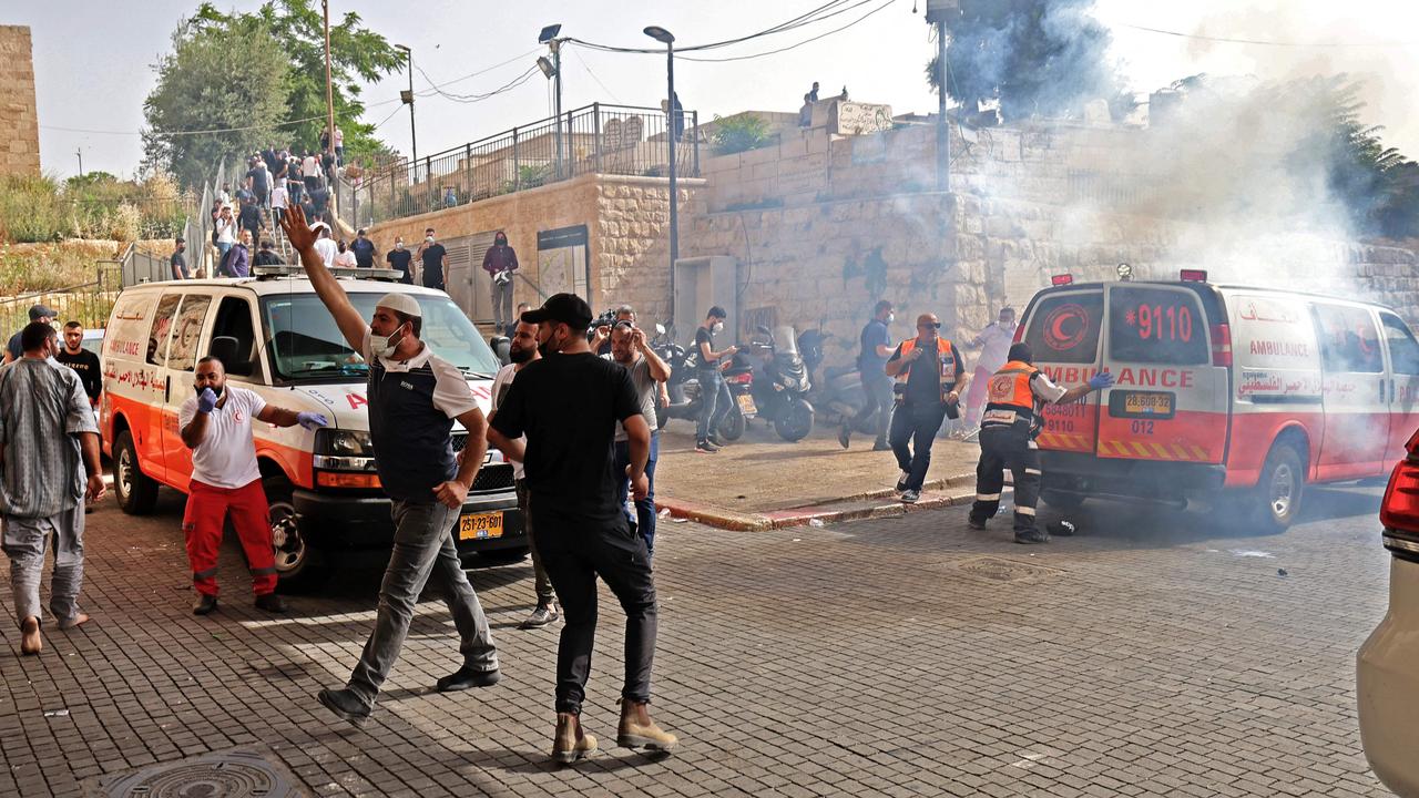 More than 200 were hospitalised and five were in critical condition as violence between Israelis and Palestinians flared at the Al-Aqsa mosque. (Photo by EMMANUEL DUNAND / AFP)