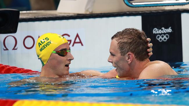 Australian teammate Cameron McEvoy congratulates Chalmers after finishing seventh