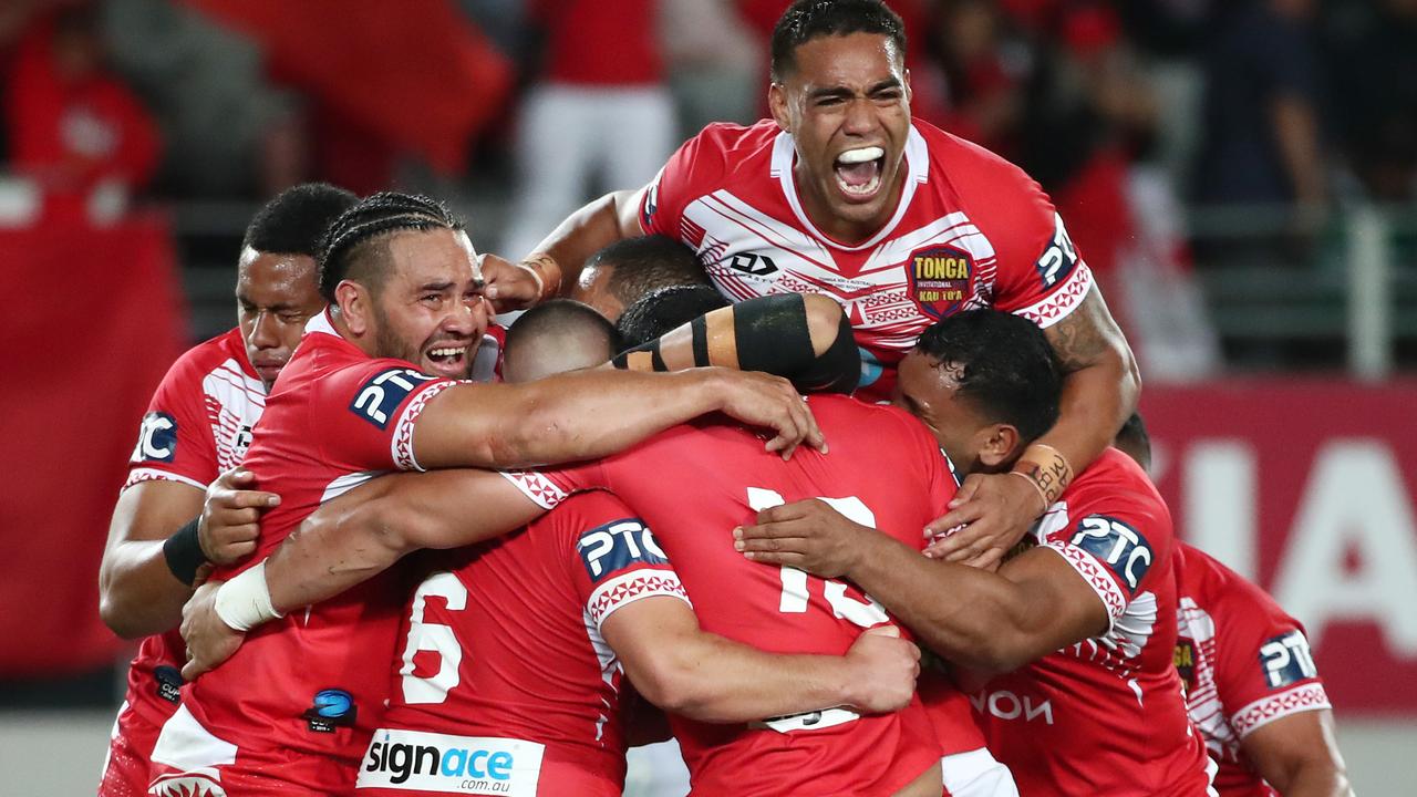 Tonga celebrate their win over Australia