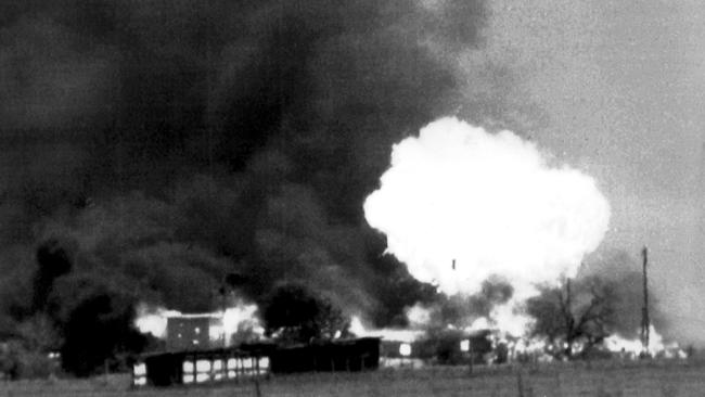 A massive fireball erupts following an explosion during a fire that levelled the Branch Davidian compound outside Waco, Texas, in April, 1993.