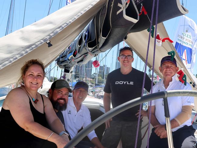 Nick Smith (centre, at rear) with the crew of Bowline, during preparations on Christmas Day 2024. Picture: Summer Liu