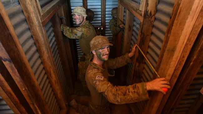 Exercise Brolga Run at the Townsville Field Training Area at High Range. Soldiers from 3CER build a Brigade Command Post bunker. Sapper David Spiller and Sapper Abraham Rowe. Picture: Evan Morgan