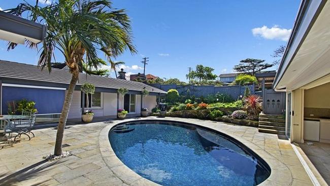 The home includes a swimming pool, as seen in this photo taken when the property was listed for rent. The property has undergone minor changes since then.
