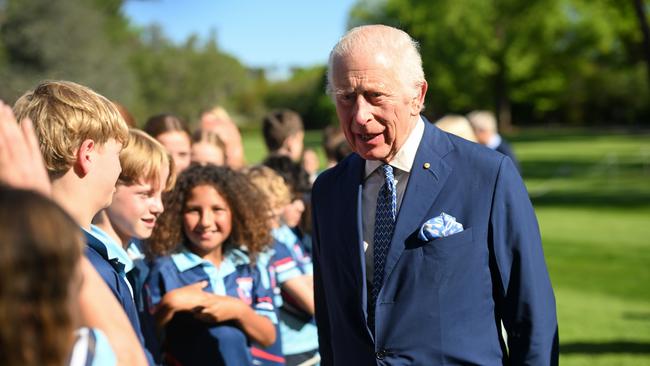 King Charles III speaks to schoolchildren in the grounds of Government House after a tree planting ceremony on October 21, 2024 in Canberra, Australia. Picture: Victoria Jones - Pool/Getty Image