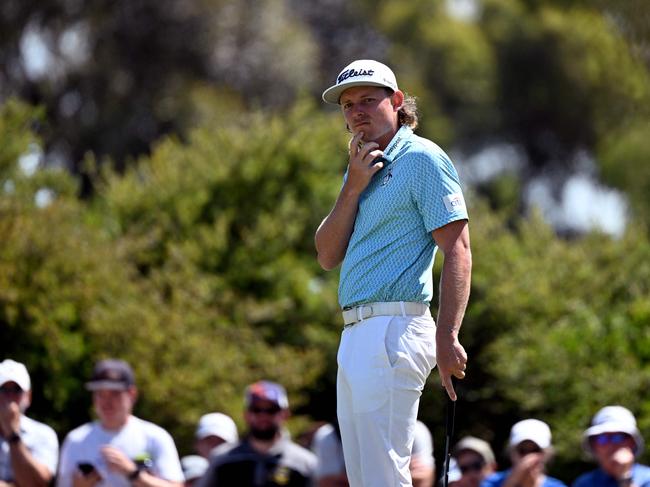 Australia's Cameron Smith reacts after missing a putt during the second round of the Australian Open golf tournament at the Kingston Heath course in Melbourne on December 2, 2022. (Photo by William WEST / AFP) / -- IMAGE RESTRICTED TO EDITORIAL USE - STRICTLY NO COMMERCIAL USE --