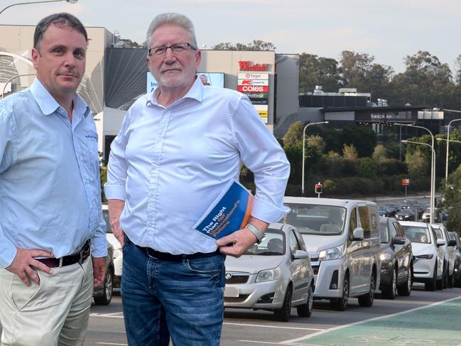 Theodore MP Mark Boothman and Coomera MP Michael Crandon at Coomera on Tuesday October 8 where they announced a commitment of $5 million towards a business case for east west connections across the M1 if the LNP is elected. Picture: Keith Woods.