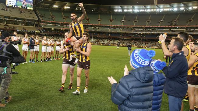 Clarkson joins the guard of honour to show respect for Shaun Burgoyne after his 350th career game last year. Picture: Michael Klein