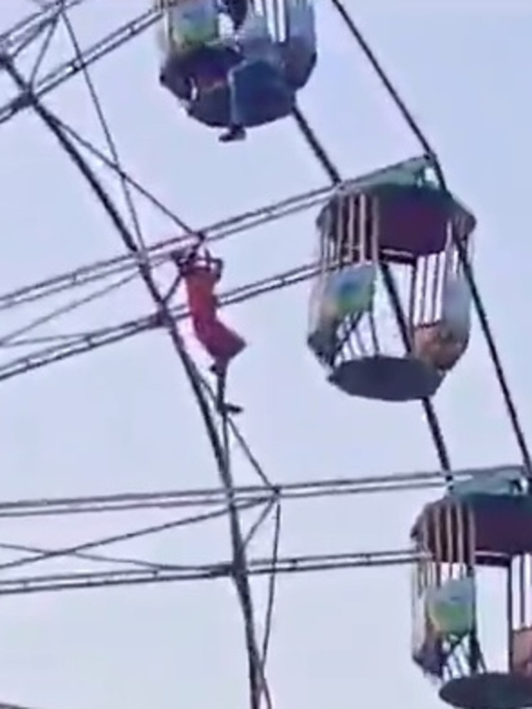 The teenage girl was left dangling almost 20 metres Picture: Jam Press