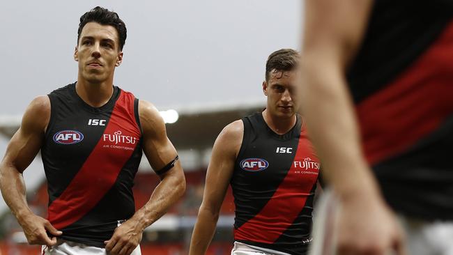 Essendon recruit Dylan Shiel walks off Giants Stadium.