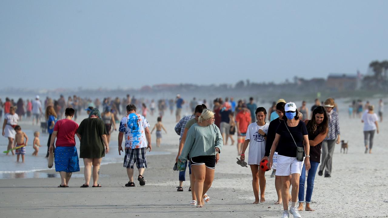 The images of crowds on Florida’s beaches has prompted the hashtag #FloridaMoron on social media. Picture: Sam Greenwood/Getty Images