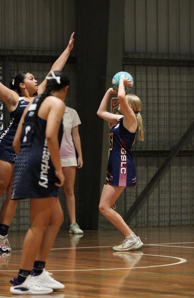 Netball action at QISSN 2024. Canterbury College v Good Shepherd Lutheran College