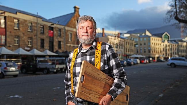 Owner of Wood on Salamanca, Graeme Young of Margate is unhappy that he and other stall holders don't know when they can come back and trade. Picture: Zak Simmonds