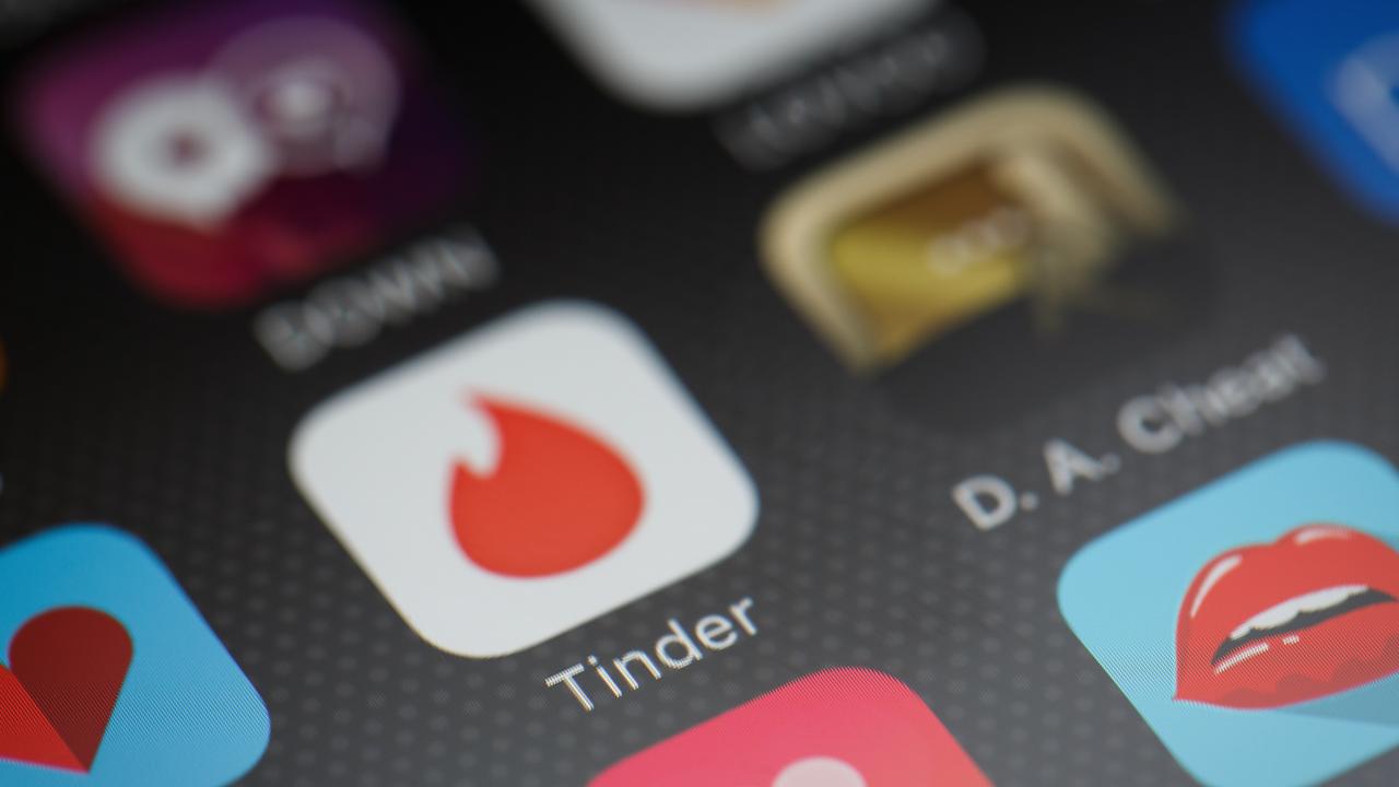 People are committing crimes against others they meet on dating apps. (Photo by Leon Neal/Getty Images)