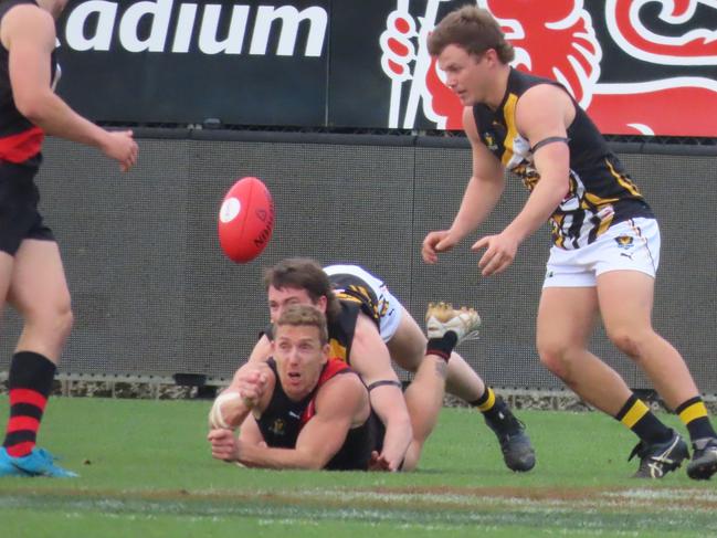 North Launceston's Brad Cox-Goodyer gets a handball away. Picture: Jon Tuxworth