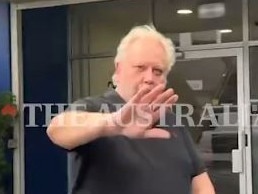 Richard White dodges reporters from The Australian as he exits WiseTech HQ after stepping down as CEO.