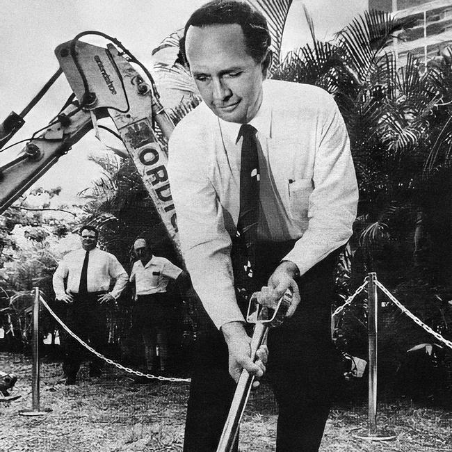 Keith DeLacy turns the first sod on the Cairns Convention Centre.