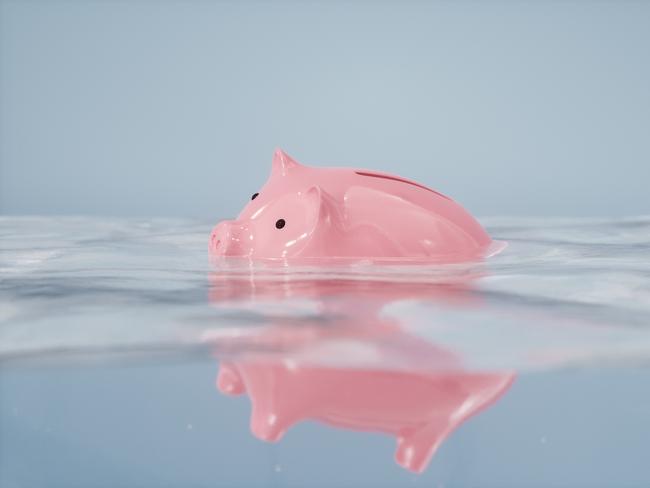 Sinking piggy bank in the water; recession household pressure generic