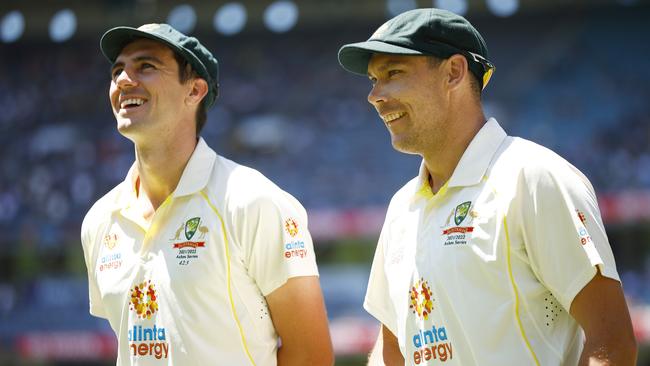 Pat Cummins, left, and Scott Boland after the win in Melbourne on Tuesday. Picture: Getty Images