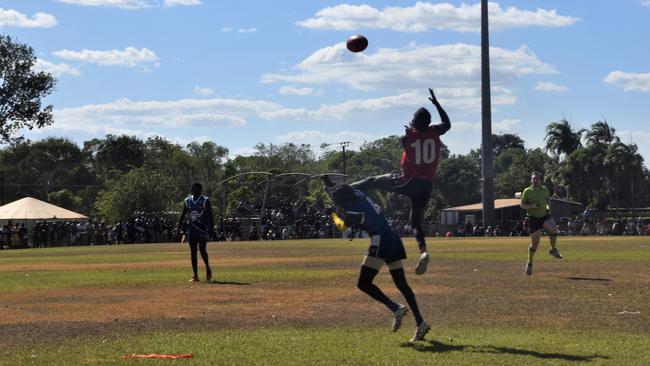 Thunder’s Adam Tipungwuti takes the mark of the day in the Tiwi Island Football League grand final between Tuyu Buffaloes and Pumarali Thunder. Picture: Max Hatzoglou