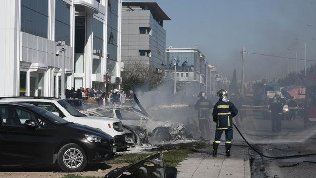 Fire crews extinguish Malkoun’s car, which exploded when he turned the key. Picture: Supplied