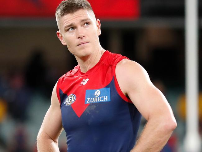 A frustrated Adam Tomlinson laments the Demons’ fade out. Picture: AFL Photos/Getty Images