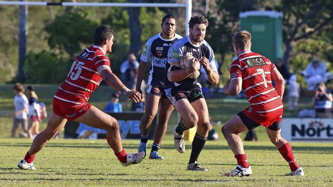 Ballina's Robby Miles heading towards Ben Webber at full pace during the Ballina v Byron Bay NRRRL Grand final. September 14, 2014. Photo: Nolan Verheij-Full / Northern Star.