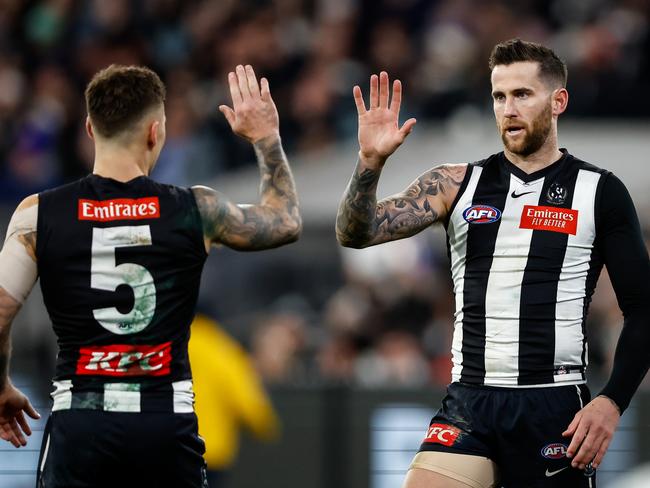 MELBOURNE, AUSTRALIA - JULY 28: Jeremy Howe of the Magpies celebrates a goal during the 2023 AFL Round 20 match between the Collingwood Magpies and the Carlton Blues at The Melbourne Cricket Ground on July 28, 2023 in Melbourne, Australia. (Photo by Dylan Burns/AFL Photos via Getty Images)