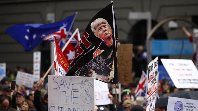 A Donald Trump flag is seen during a rally against the state government's proposed pandemic laws, in Melbourne. Picture: NCA NewsWire / Daniel Pockett