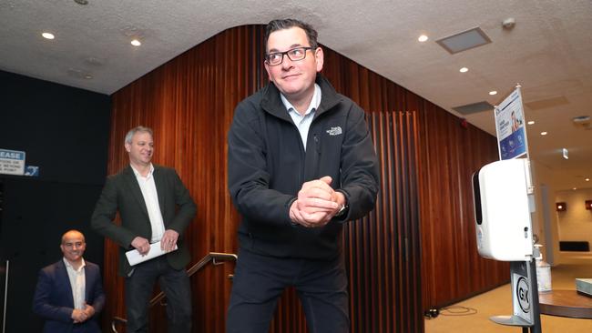 Premier Daniel Andrews sanitises his hands after a press conference. Picture: David Crosling/NCA NewsWire.