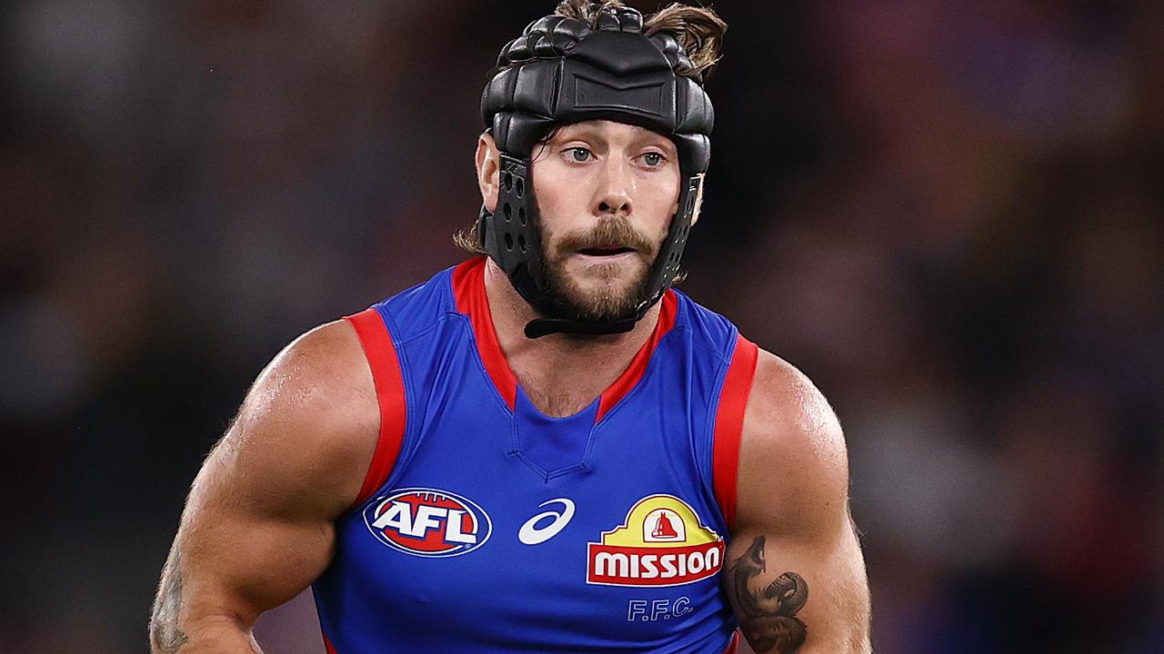 Caleb Daniel is one of the few players who wears a helmet in the AFL. Picture: Michael Klein