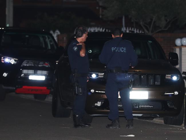 Police investigate the shooting in Merrylands.