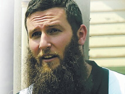 Musa Cerantonio, left leaves Maidstone mosque. Xxxxx picture needs to have identity confirmed xxxxxxx