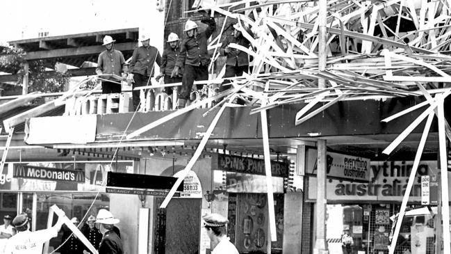 Police and fire brigade officers at scene of Downunder Backpackers Hostel fire at Kings Cross in Sydney where six backpackers died, 17/09/1989. Arsonist Gregory Allan Brown was later arrested and charged over the blaze. Pic Robert Doran.