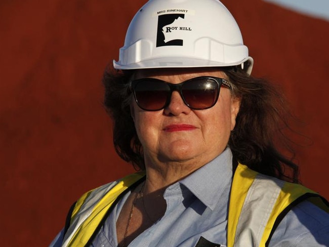 Billionaire Gina Rinehart, chairman of Hancock Prospecting Pty, stands for a photograph during a tour of the company's Roy Hill Mine operations under construction in the Pilbara region, Western Australia, on Thursday, Nov. 20, 2014. Rinehart, the Asia-Pacific's richest woman, is set to start exports in September from her new A$10 billion ($8.6 billion) iron ore mine undeterred by prices trading near five-year lows and forecast to extend losses. Photographer: Philip Gostelow/Bloomberg *** Local Caption *** Gina Rinehart