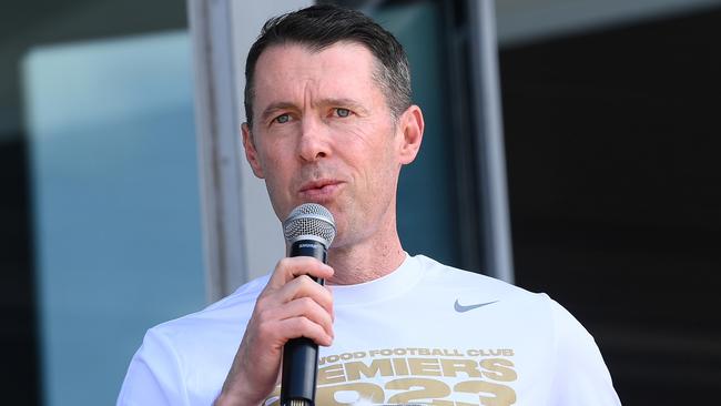 MELBOURNE, AUSTRALIA - OCTOBER 01: Magpies head coach Craig McRae speaks on stage during the Collingwood Magpies AFL Grand Final celebrations fan day at AIA Centre on October 01, 2023 in Melbourne, Australia. (Photo by Quinn Rooney/Getty Images)