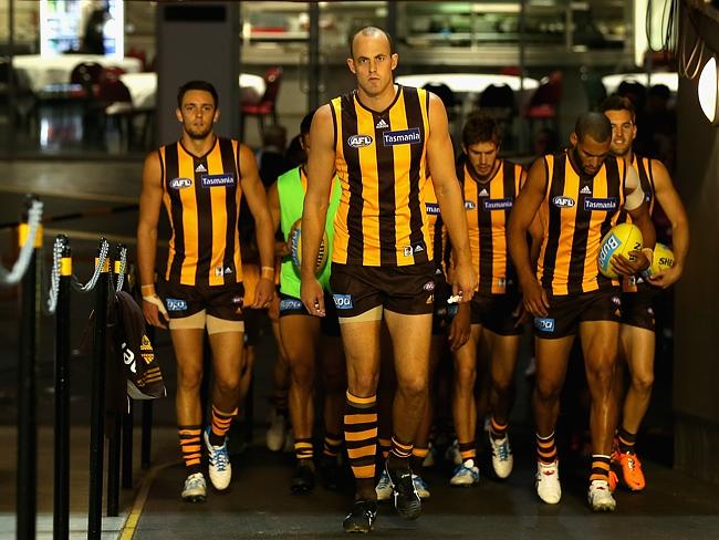 200-gamer David Hale leads Hawthorn up the race on Friday night at the MCG.