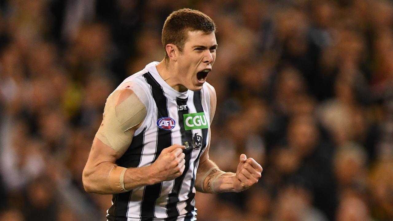 Mason Cox celebrates one of his three second quarter goals on Friday night.